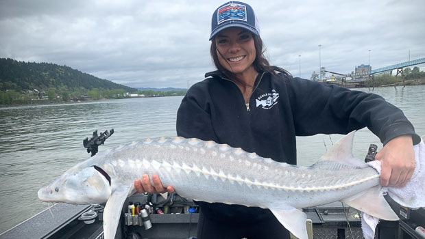 Happy lady with her Willamette River Sturgeon